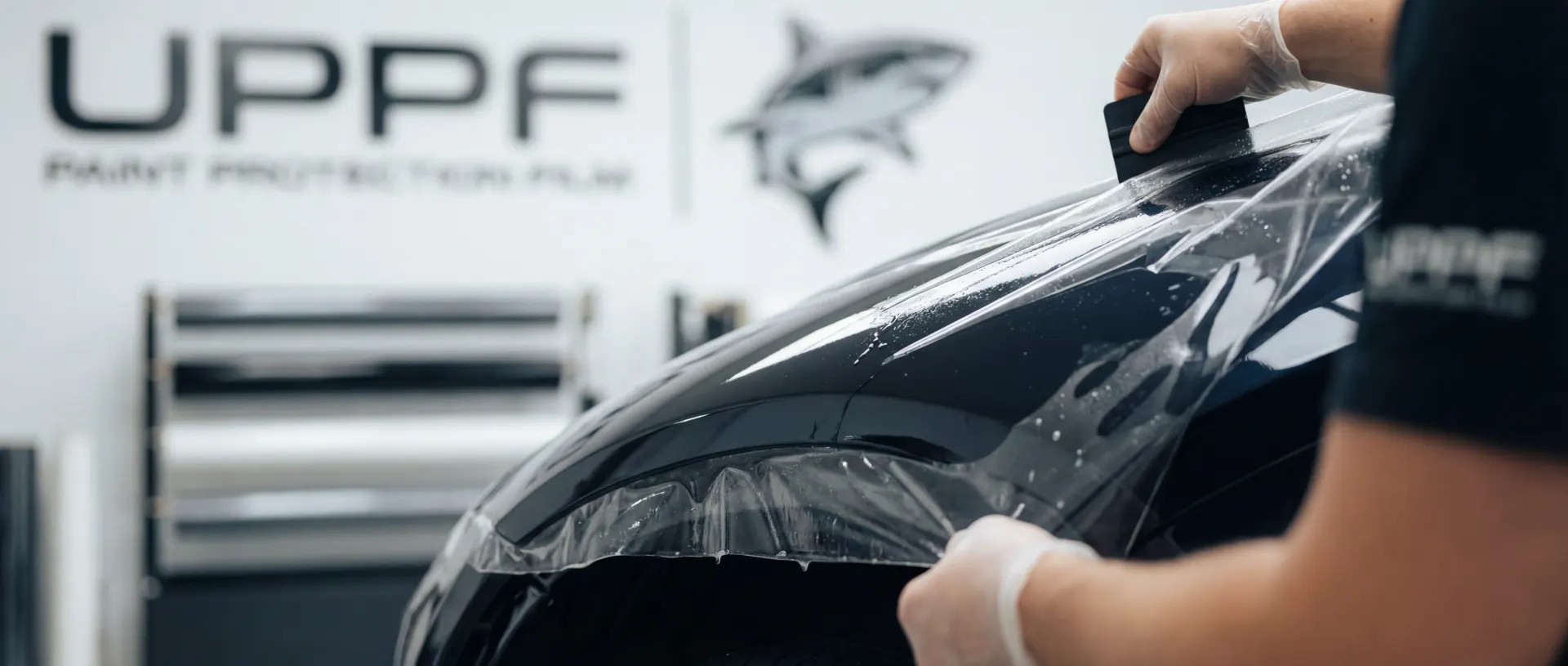 Cybertruck PPF Houston – Professional Paint Protection Film for Tesla Cybertruck Tesla Cybertruck with professional paint protection film installation in Houston showing stainless steel panels and angular design